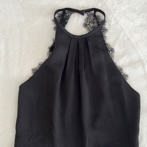 NWT. Holiday - Jumpsuit. Lace and Crepe material jumpsuit.